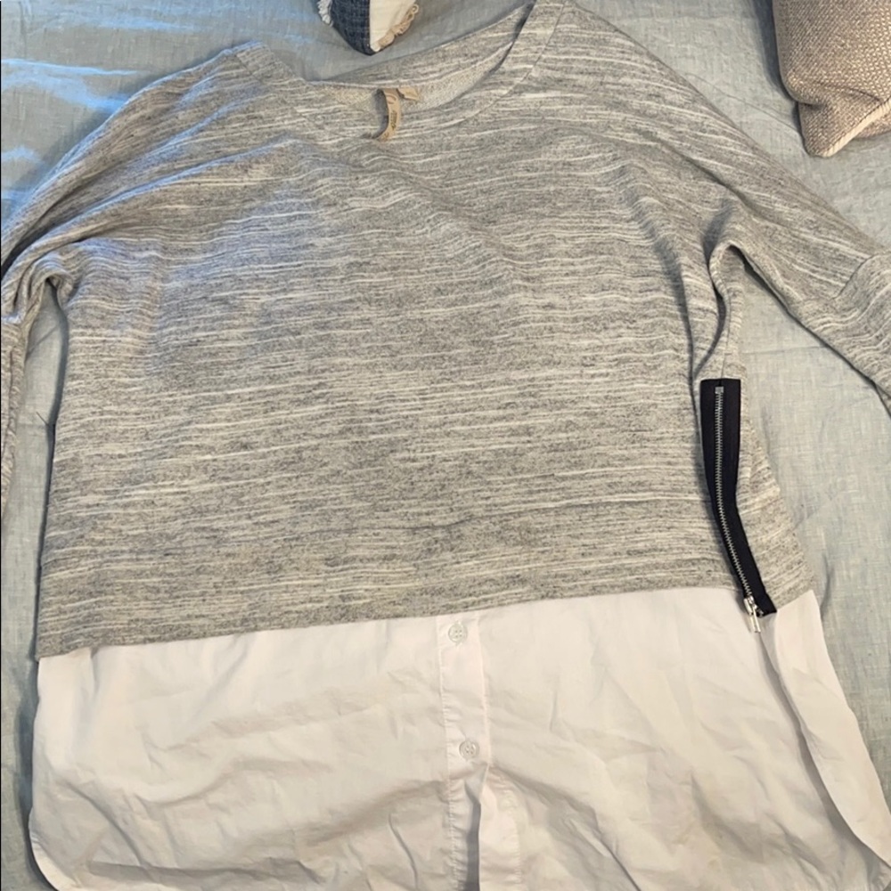 Grey and white top.